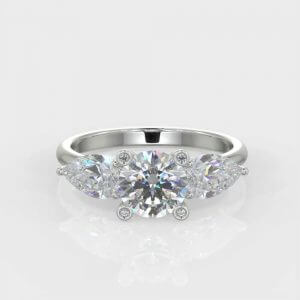 1 x 0.70ct Round Brilliant Cut 2 x 0.25ct Pear  Brilliant Cut  Diamond Ring